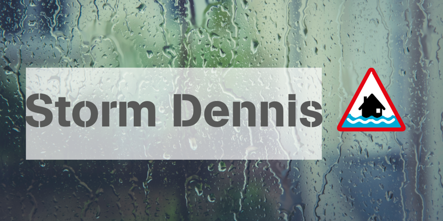 Image of rain on a window with the text Sotrm Dennis Image of rain on a window with the text Sotrm Dennis