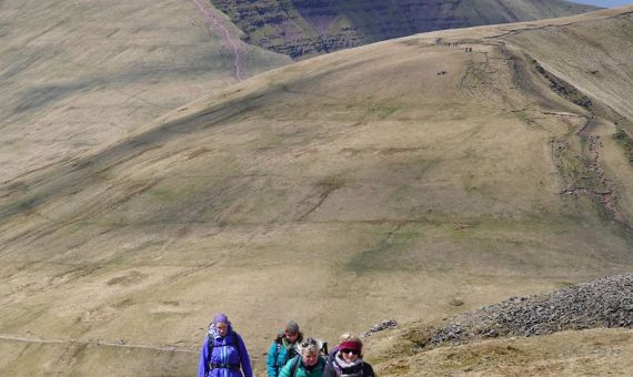 Hikers walking on Brecon Beacons