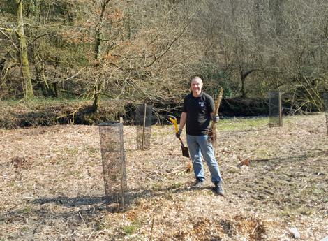 NRW staff planting Cherry tree at Abercarn picnic site NRW staff planting Cherry tree at Abercarn picnic site