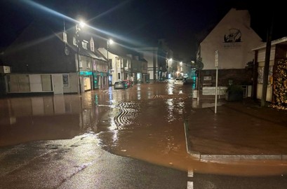 Photo of deep floodwater on a town street