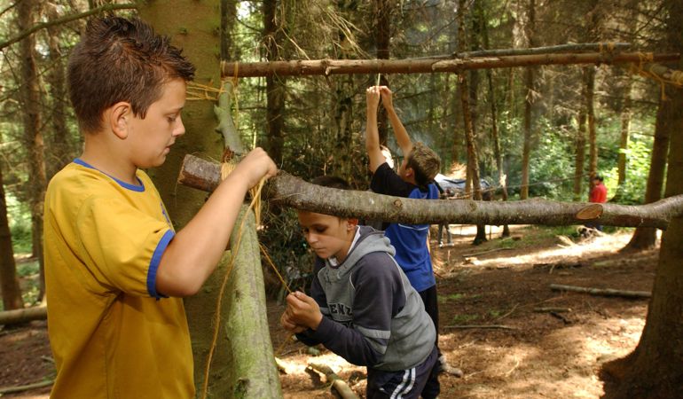 Children enjoying the woodlands Children enjoying the woodlands