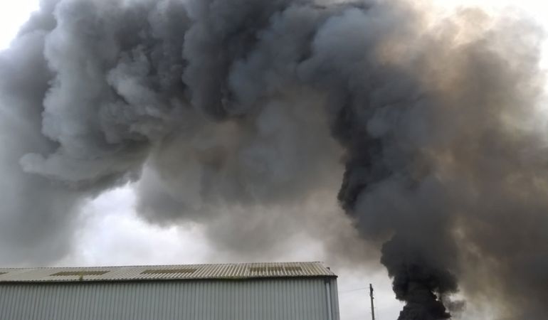 Smoke coming from the recycling plant fire on the Llandow Trading Estate Smoke coming from the recycling plant fire on the Llandow Trading Estate