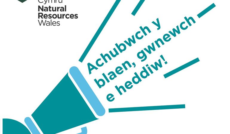 Drawing of a cartoon figure holding a loudhailer in the air with the words Achubwch y blaen, gwnewch e heddiw! coming out of the loudhailer Drawing of a cartoon figure holding a loudhailer in the air with the words Achubwch y blaen, gwnewch e heddiw! coming out of the loudhailer