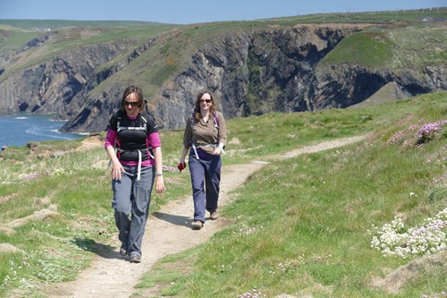 Two women walking along a national trail