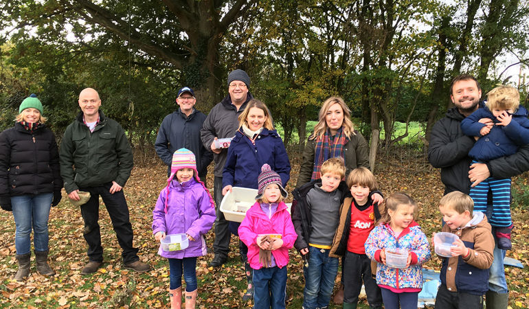 Children collecting acorns Children collecting acorns