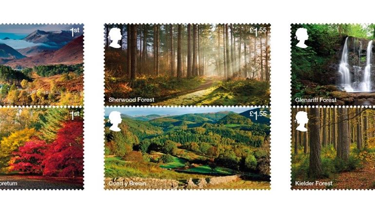 An image of six stamps, each with a photo of a different forests across the UK