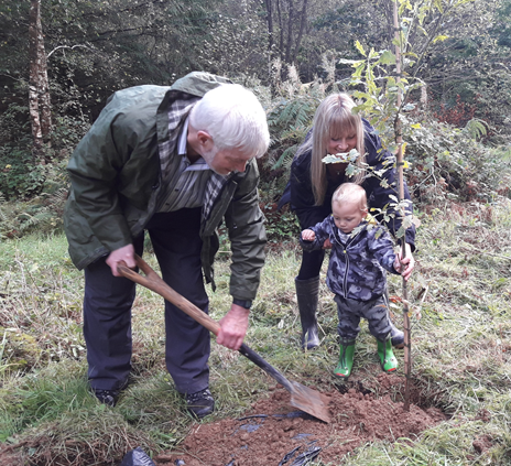 Terry Davis and Caroline riches planting an oak tree