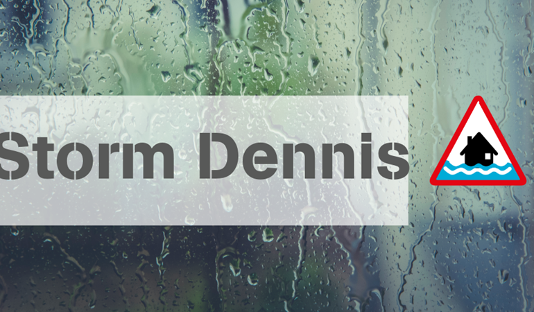 Image of rain on a window with the text Sotrm Dennis