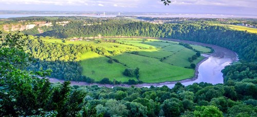Ariel photograph depicting the wide meanders for the lower Wye gorge with limestone cliffs from Eagles Nest