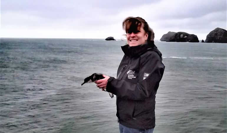 Nia Stephens and a manx shearwater