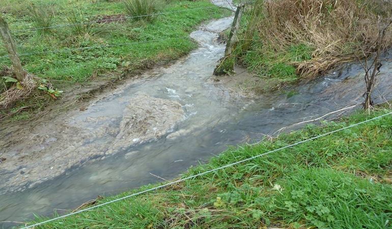 Cwrt Farm effluent in river