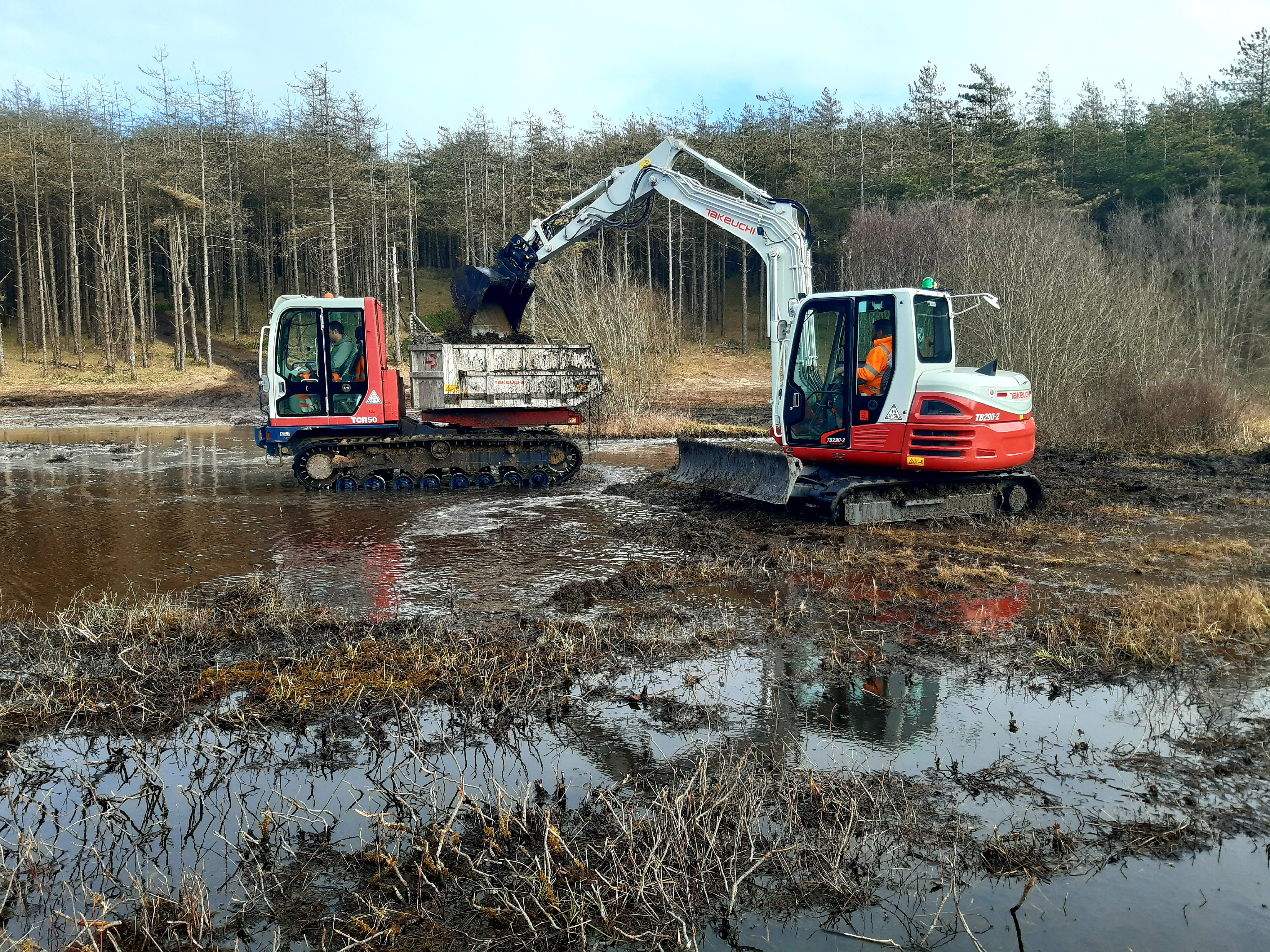 Diggers working on site at Newborough