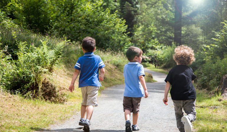 children walking along a path 