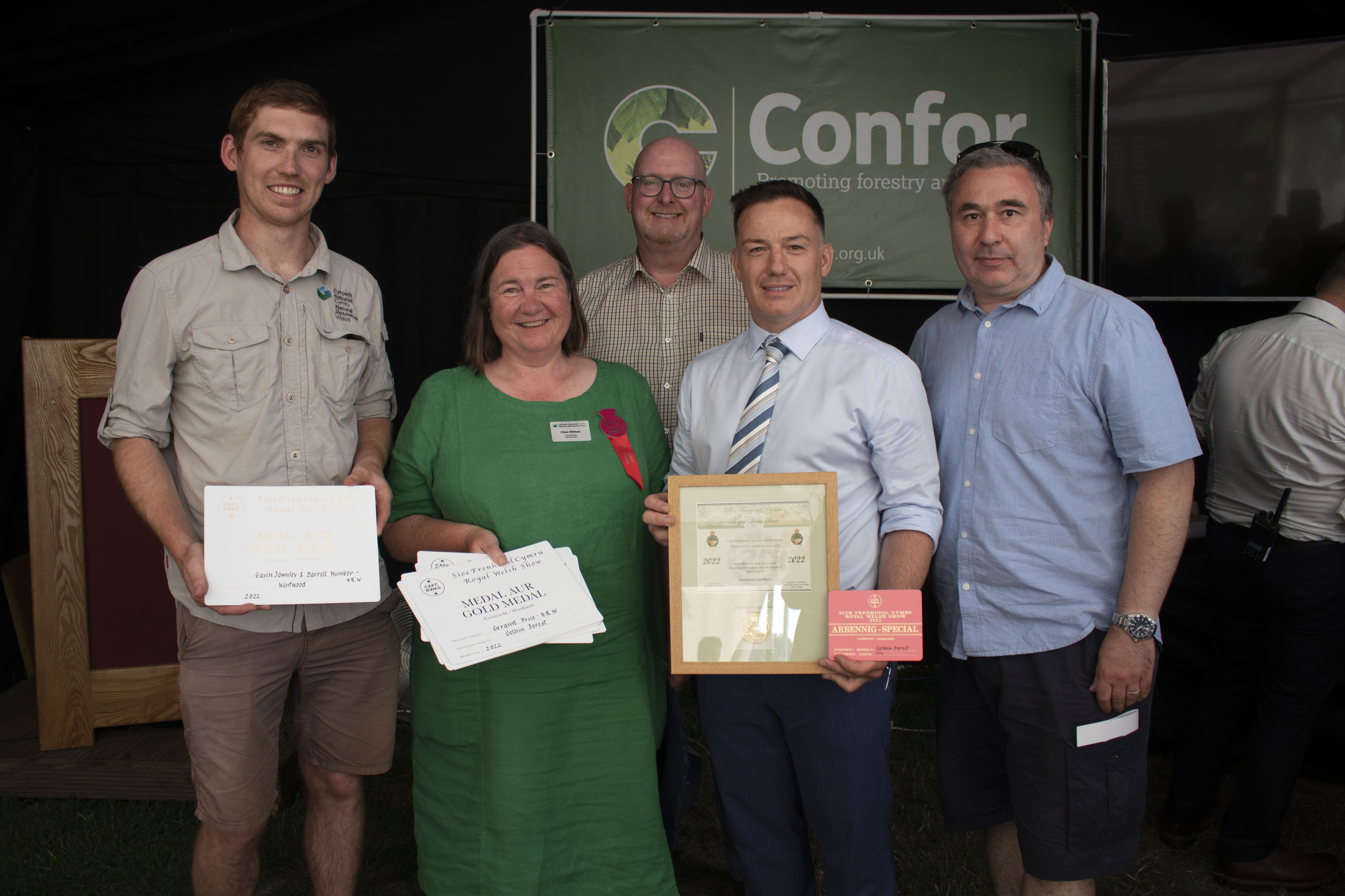 Winners of the awards standing with their certificates