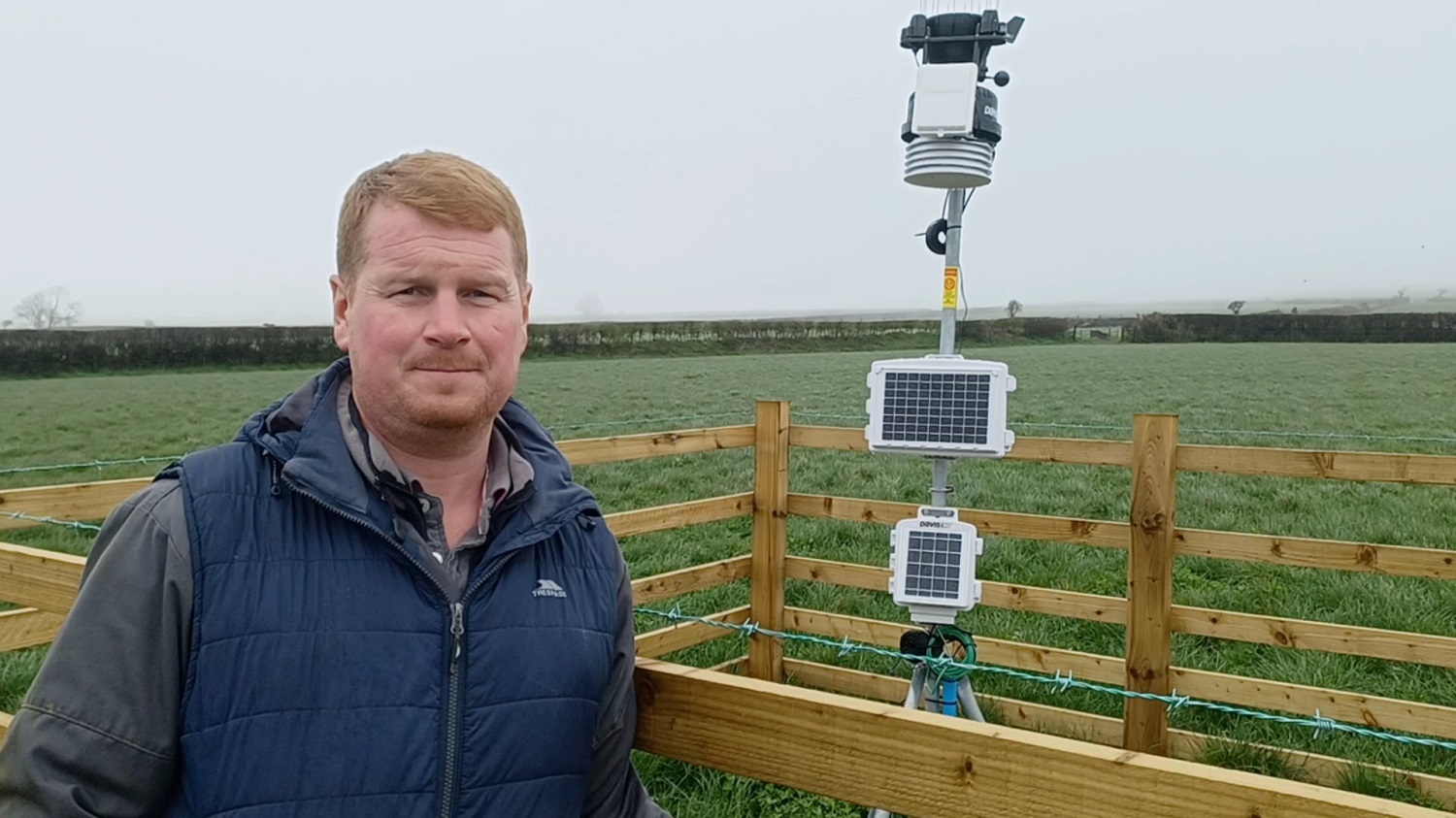 Michael Williams with weather station installed at Fagwr Fran East Farm in Pembrokeshire