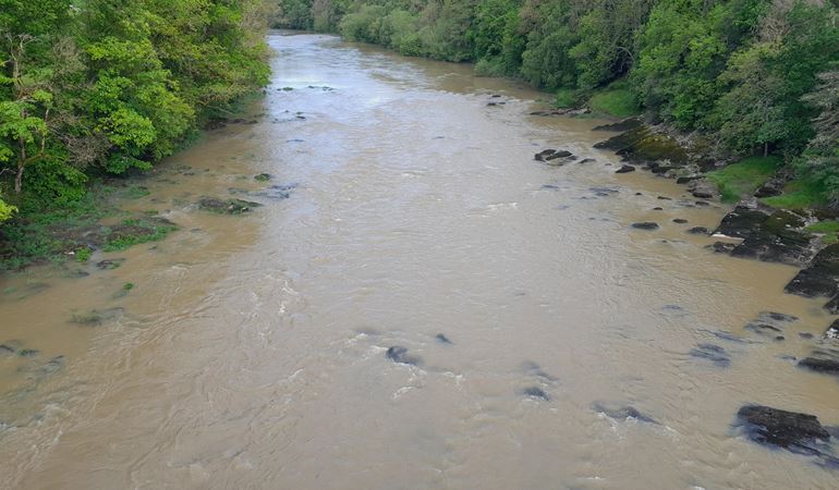 River Wye with murky brown water