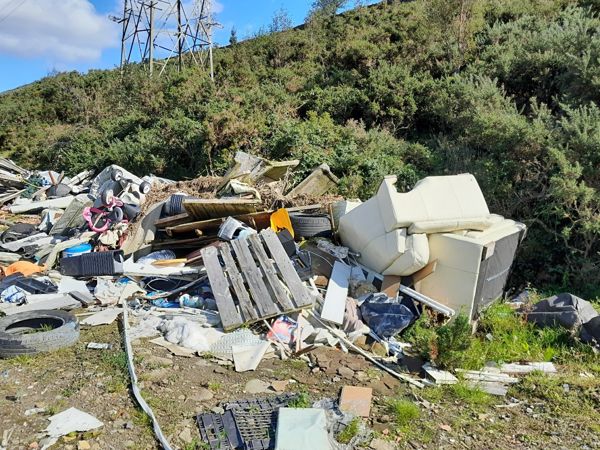 Mixed waste including tyres, wood and household items Mixed waste including tyres, wood and household items
