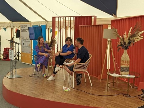 Heledd, Manon and Osian disscussing trio writing at the Eisteddfod 2023